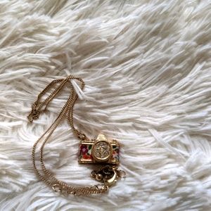 Gold camera necklace